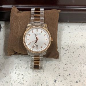 Michael Kors rose gold color and transparent watch